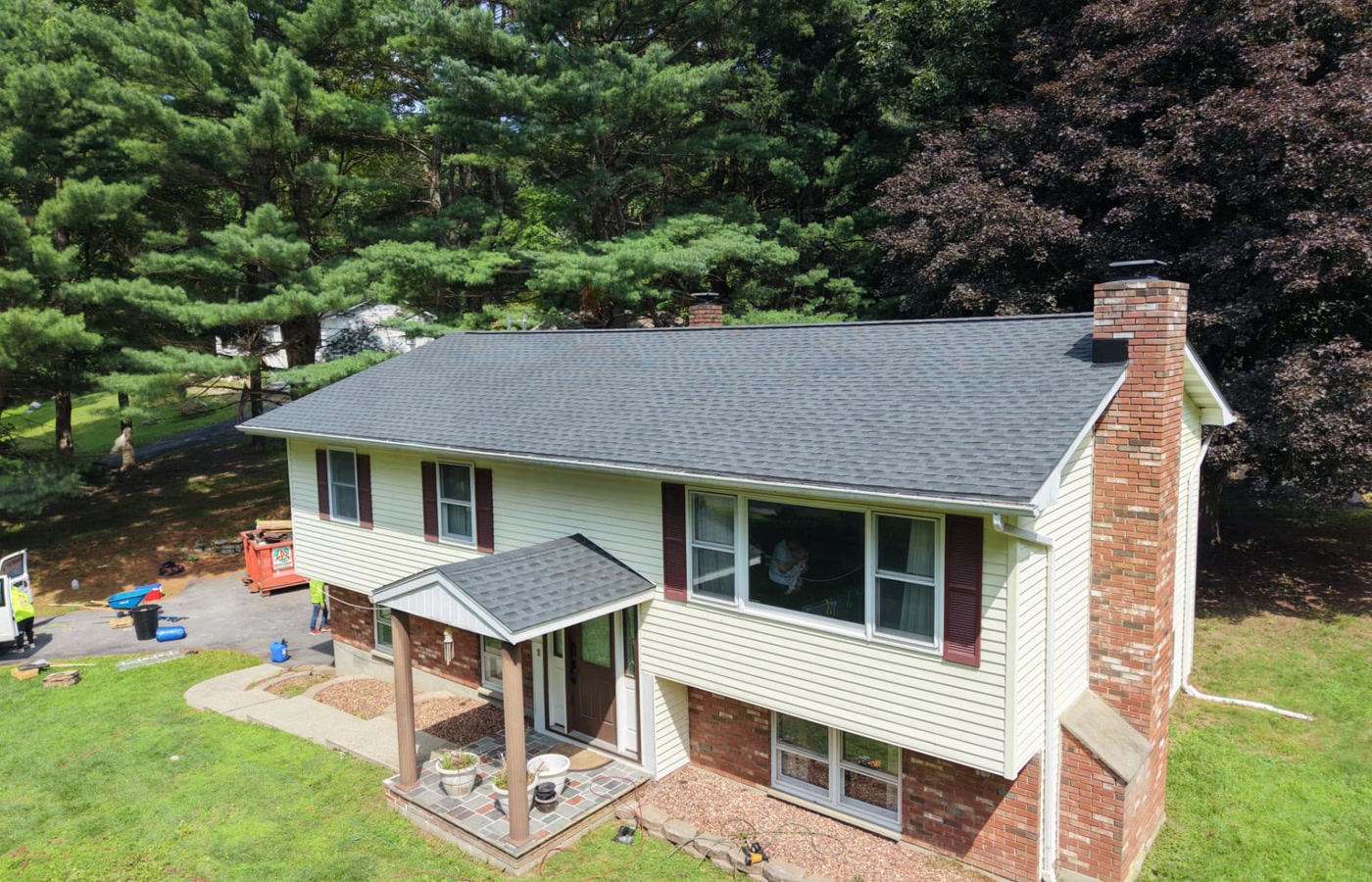 Close-up of freshly installed dark architectural asphalt shingles